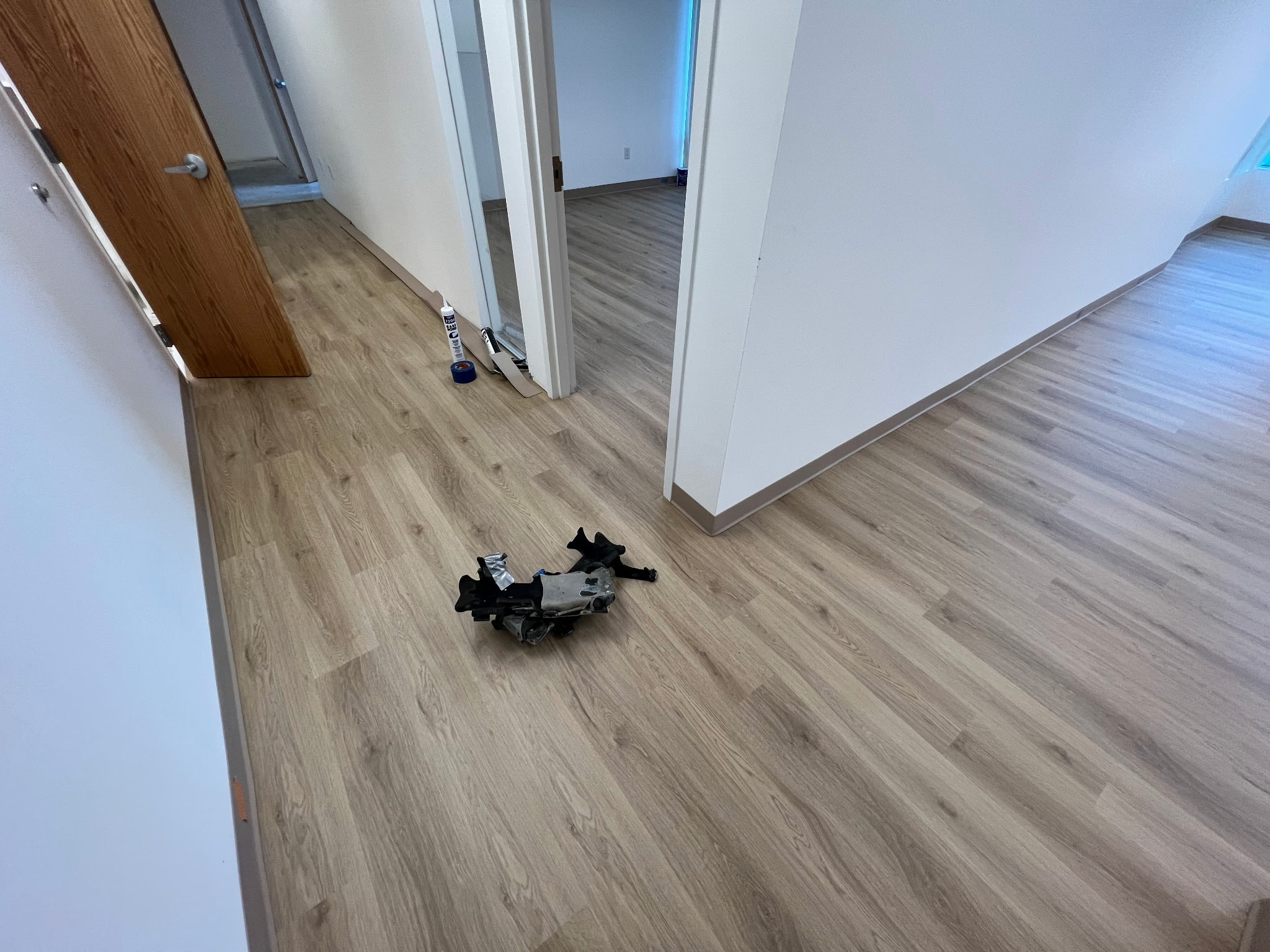CoreTec Flooring - Hallway and Multiple Rooms